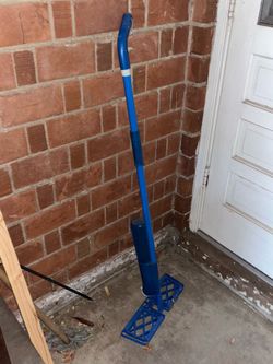 Blue And White Swifter Duster Cleaning