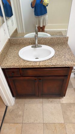 Vanity with granite top and sink