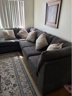 Gray Fabric Sectional Sofa with Pillows