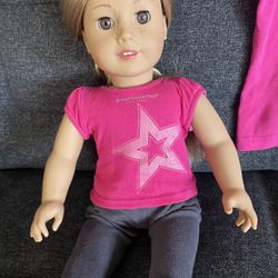  American  Girl Doll With A Matching Shirt