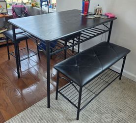 Table with stools and bench
