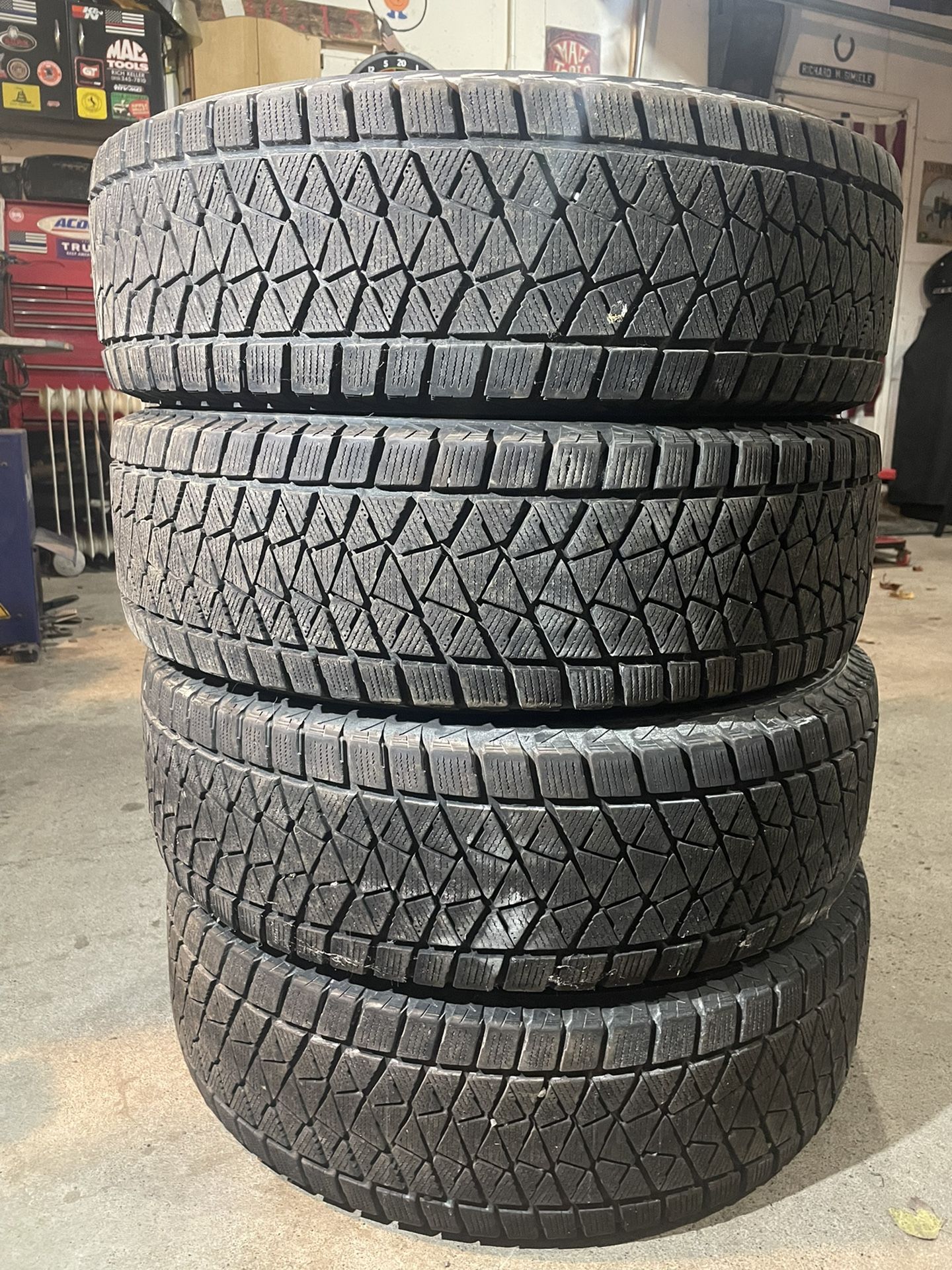 Four - 215/70/16 Bridgestone Blizzak DM-V2 Tires