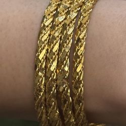 Set of 4 gold plated bangles size 2.6" brand new All 4 bangles in $75