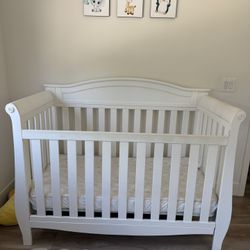 Delta Children 4-in-1 Crib + Waterproof Mattress & Bed Rail 