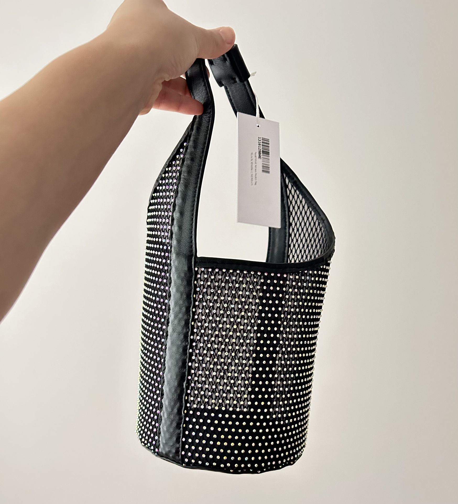 Reformation bucket bag.