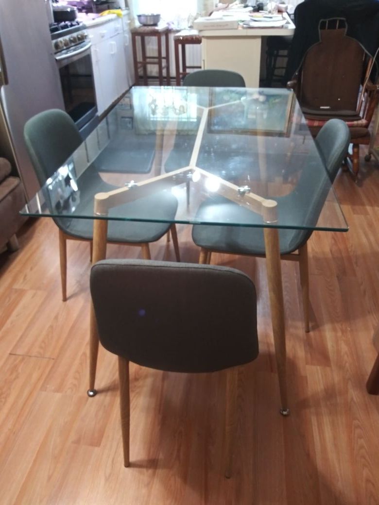 Glass Dining Table with four matching chairs