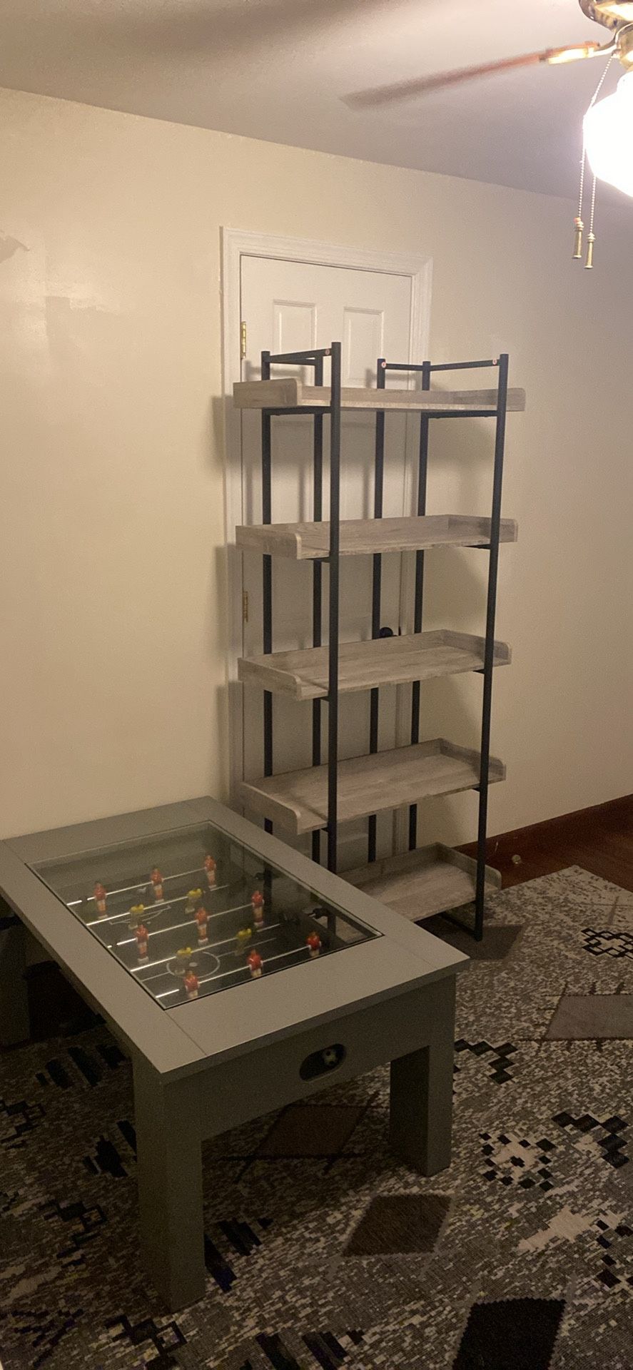 Rug, Foosball Table And Book Case 