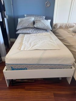 Twin Size bed mattress and white frame