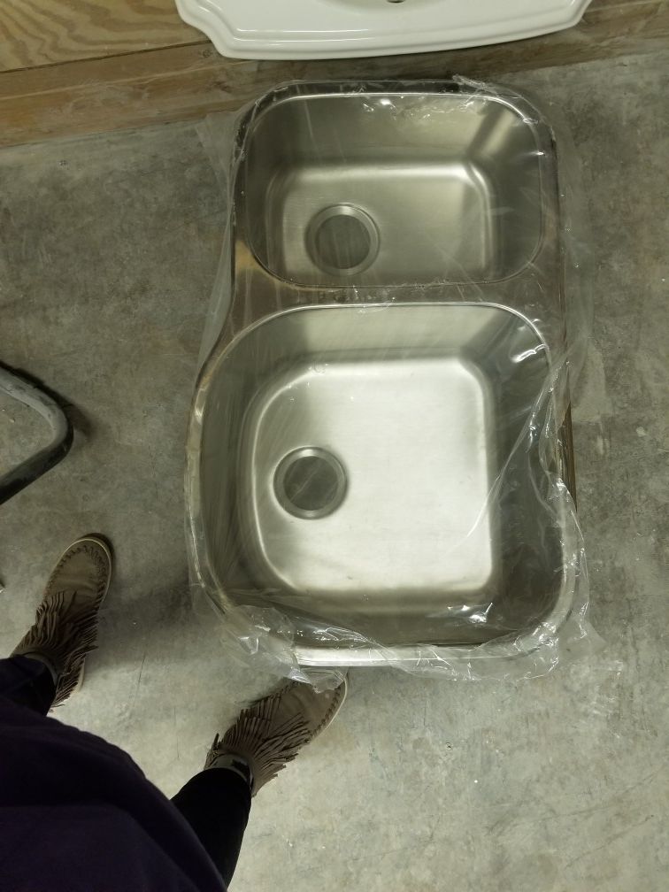 Kitchen sinks . New and used