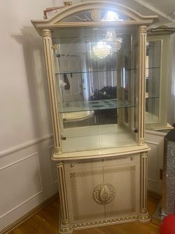 Beige china cabinet with table and chairs set