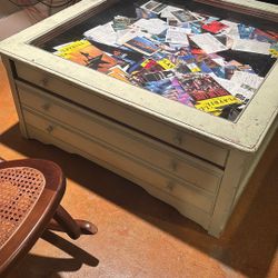Coffee Table With Glass Display Top And Drawers