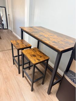 bar table and 2 stools