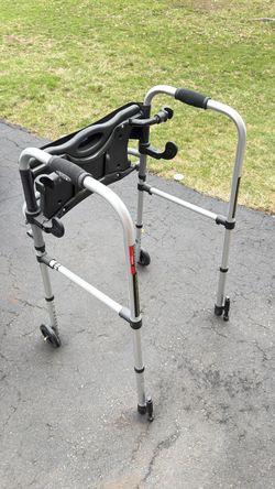 Walker with folding chair