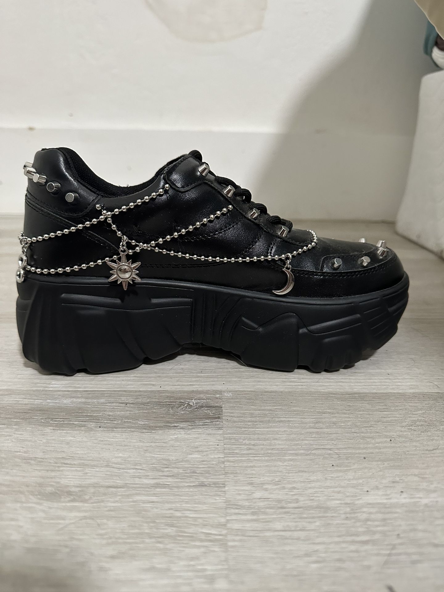 KOI Jinx Mystic Charm Black Platform Shoes.