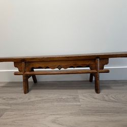 Hand-carved wooden low bench / display table