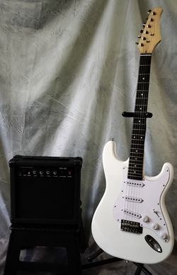 Brand new electric guitar with new 20 watts amp