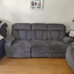 Grey three seater couch and Love seat.