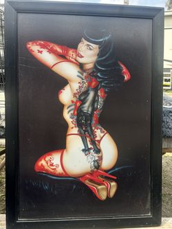 Sexy Tattooed 50’s Look alike Woman