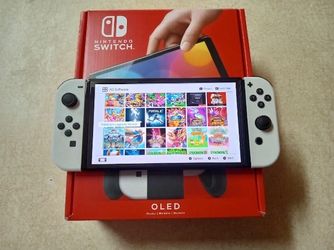 NINTENDO SWITCH OLED + 125 SWITCH GAMES