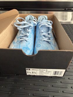 New Size 5.5 men Adizero cleats