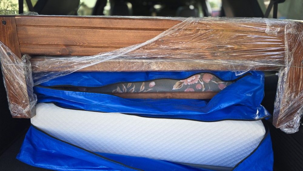Wood-framed Bed And Bookcase