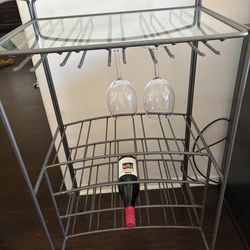 Storage Metal rack and glass top for serving.