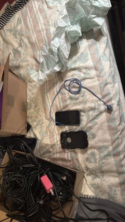 iPhone 1 with Otter Box and charger iphone 5 too