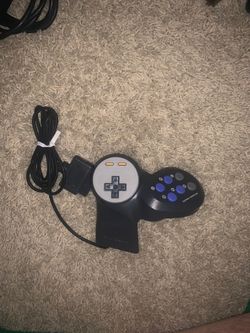 Capcom branded six button Super Nintendo controller