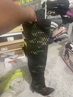 Thigh high army with fatigue, high heeled boots