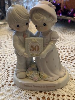 Precious moments 50th anniversary figurine