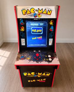 PAC Man Arcade game. Has 2 games in it.  PAC man.  And pac man plus