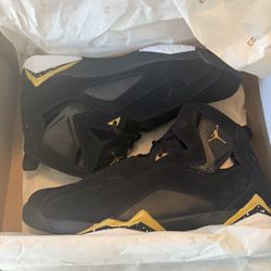 Black And Gold Jordan 7s 