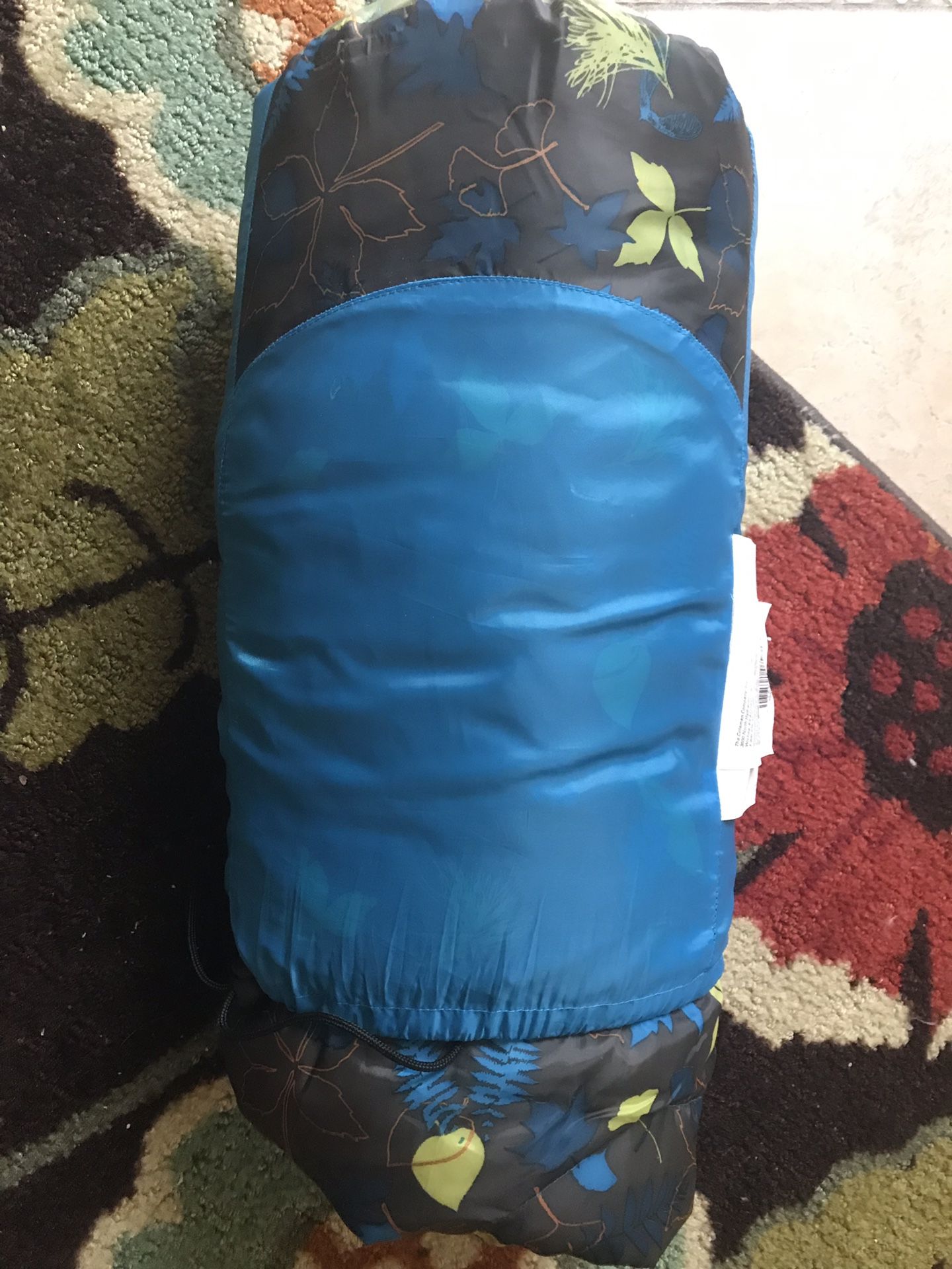 Child’s Coleman fold and store sleeping bag