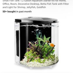 fish tank is equipped with 5W LED light and two decorative plastic aquatic plants. 