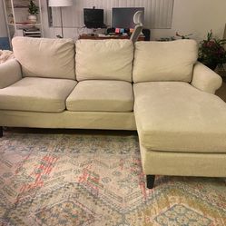 Cream White Emery Chiffon 84” Sectional Sofa with Reversible Chaise by Living Spaces