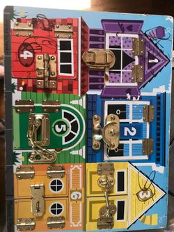 Melissa and Doug Latches Board
