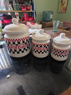 Vintage Coca-Cola Checkered Ceramic Canister Set, manufactured by Gibson Designs in 1997