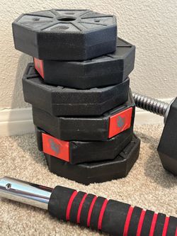 A set of interchangeable dumbbells to create different weights