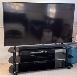 Large Black Glass Entertainment Center/TV stand With 3 Shelves