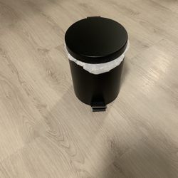 Black trash can