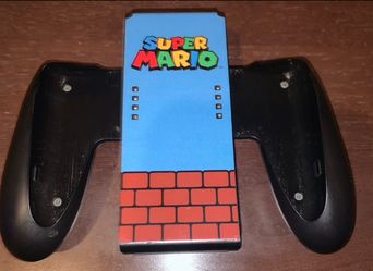 Genuine Official Nintendo Switch Joy-Con Charging Comfort Grip Super Mario Bros