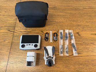 DJI Mini 3 Pro with DJI RC screen remote + Fly More kit, 3 batteries, bag