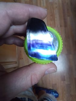 Beautiful Dark Rainbow Fluorite I Put A Dim Flashlight Underneath It So You Could See The Colors