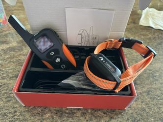 Dog training collar and transmitter