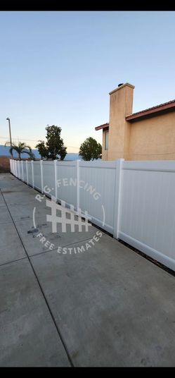 White vinyl fence