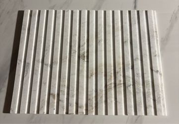 Fluted honed marble wall tile