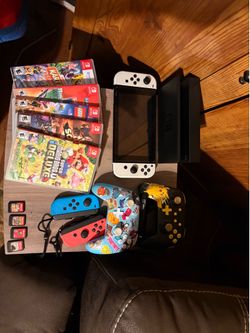 Nintendo Switch OLED Bundle – 9 Games + 2 Controllers + Cases