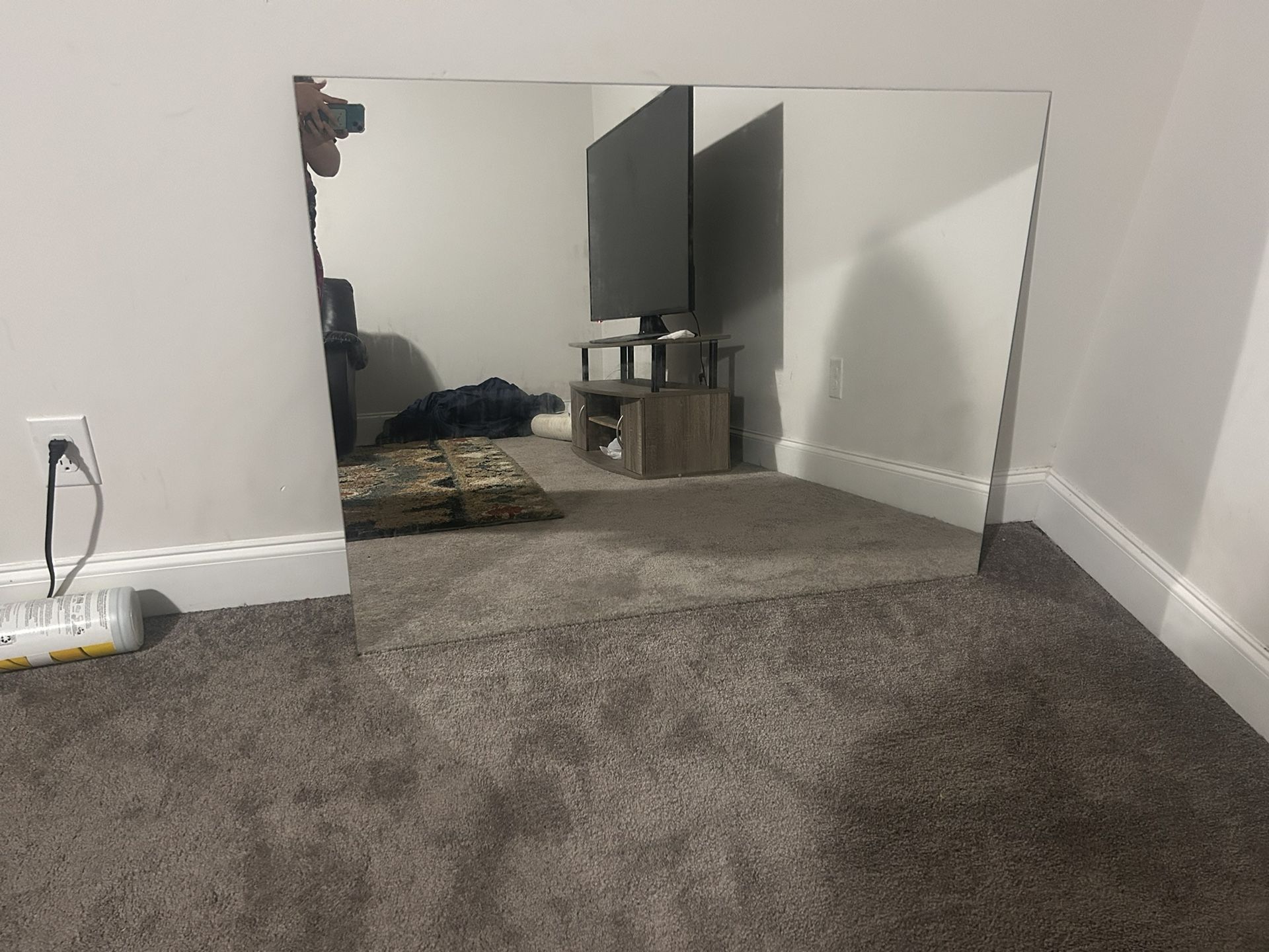 Large frameless mirror