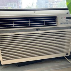 Wall AC Unit (includes remote control)