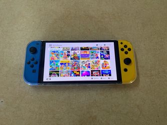 NINTENDO SWITCH OLED with 200 POPULAR SWITCH GAMES